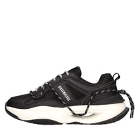 Sneakers in pelle e tessuto 