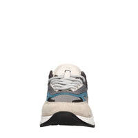 Sneakers in camoscio e tessuto 