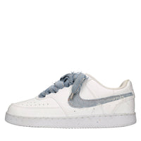 Sneakers in ecopelle e tessuto 