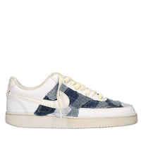 Sneakers in ecopelle e tessuto 