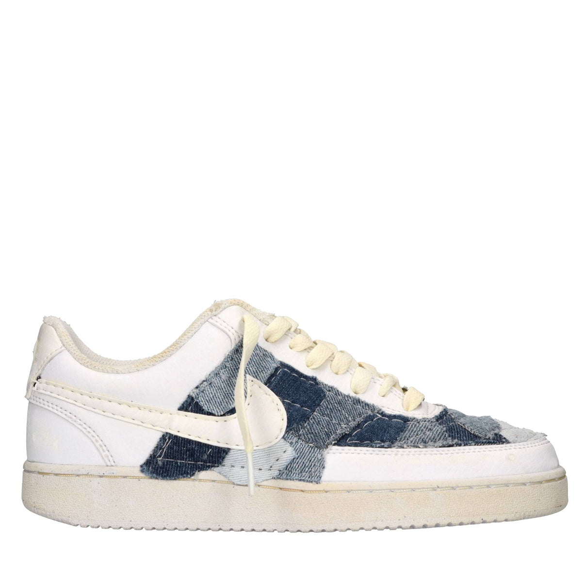 Sneakers in ecopelle e tessuto 