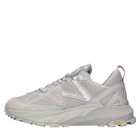 Sneakers in ecopelle e tessuto 