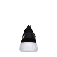 Sneakers in pelle e tessuto 