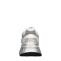 Sneakers in pelle e tessuto 