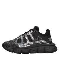 Sneakers in pelle e tessuto 