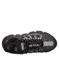 Sneakers in pelle e tessuto 