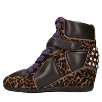 Sneakers in pelle e cavallino con borchie 