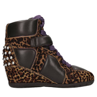 Sneakers in pelle e cavallino con borchie 
