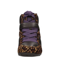 Sneakers in pelle e cavallino con borchie 