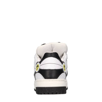 Sneakers in pelle, camoscio e tessuto 