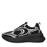 Sneakers in pelle e tessuto 