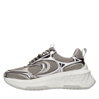 Sneakers in pelle e tessuto 