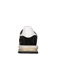 Sneakers in pelle, camoscio e tessuto tecnico 