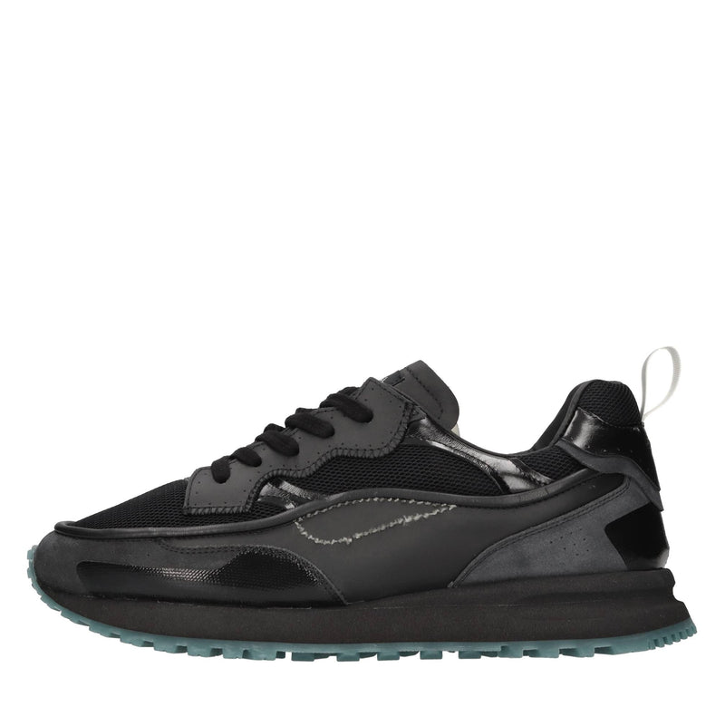 Sneakers in pelle e tessuto 