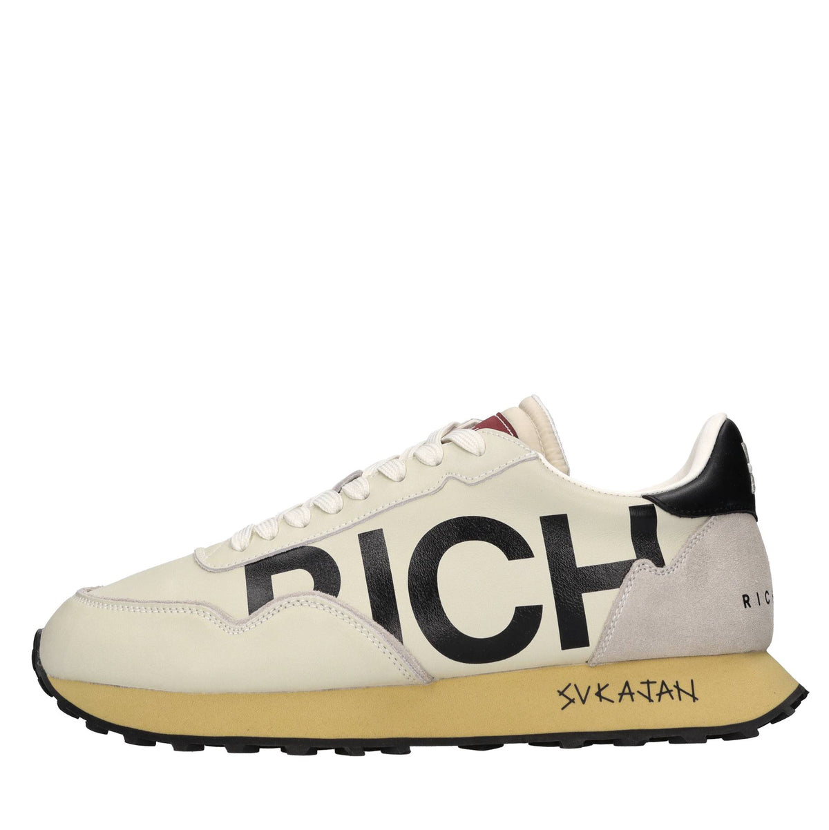 Sneakers in pelle e tessuto 