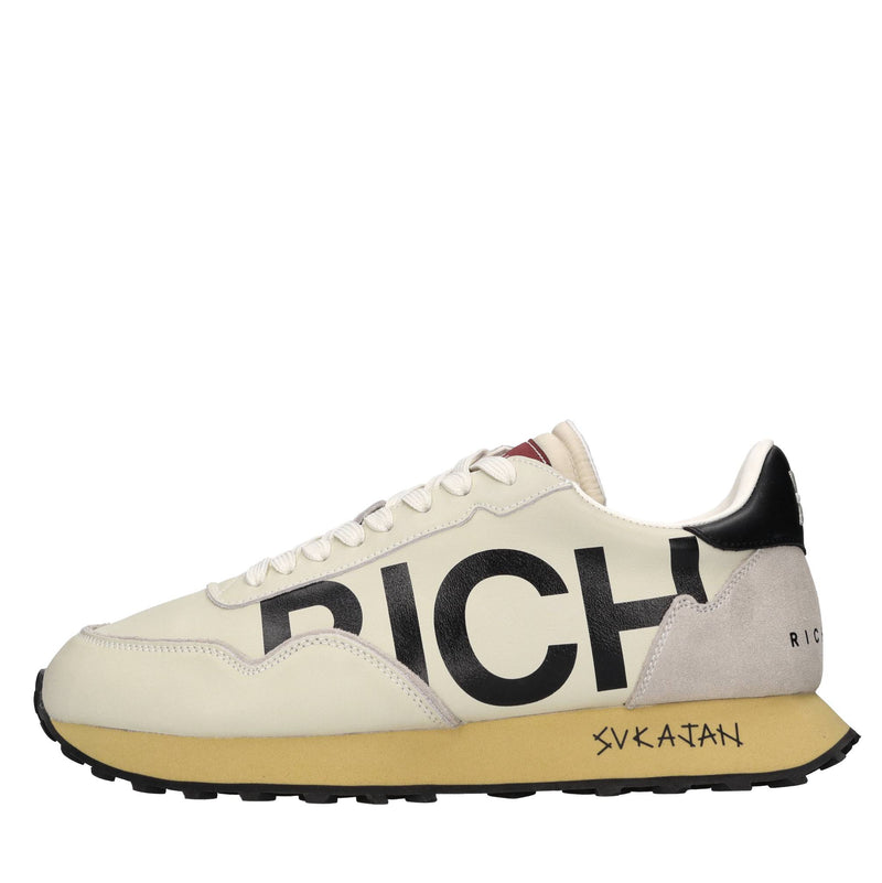 Sneakers in pelle e tessuto 