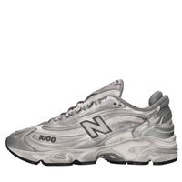 Sneakers in pelle e tessuto 
