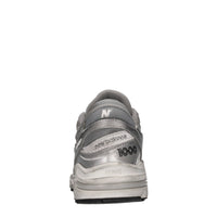 Sneakers in pelle e tessuto 