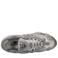 Sneakers in pelle e tessuto 