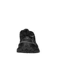 Sneakers in tessuto e altre materie 
