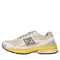 Sneakers in camoscio, tessuto e altre materie 