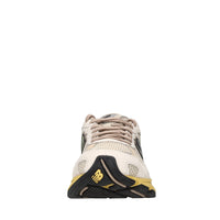 Sneakers in camoscio, tessuto e altre materie 