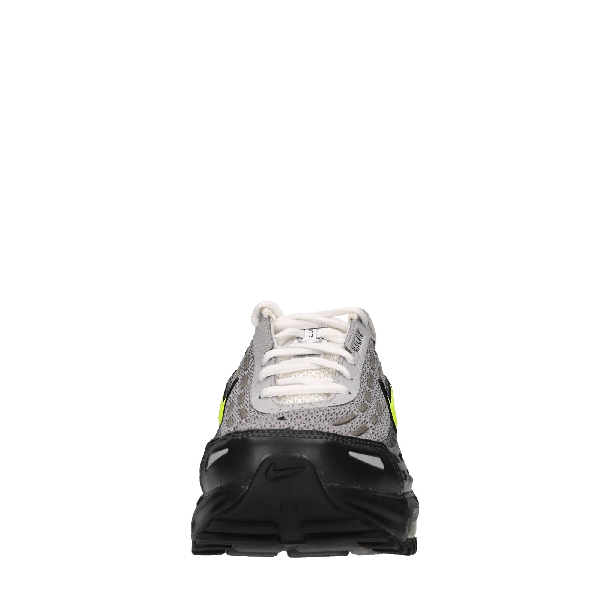 Sneakers in pelle, tessuto e altre materie 