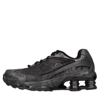 Sneakers in pelle e tessuto 