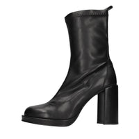 Tronchetti in pelle ed ecopelle elasticizzata 