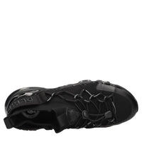 Sneakers slip-on in tessuto e altre materie 