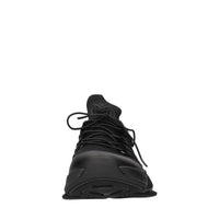 Sneakers slip-on in tessuto e altre materie 