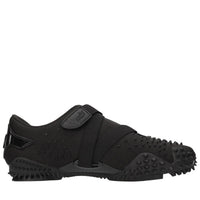 Sneakers in tessuto e altre materie 