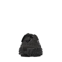 Sneakers in tessuto e altre materie 