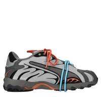 Sneakers in tessuto e altre materie 
