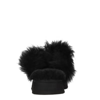 Sabot in camoscio e pelliccia 