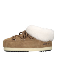 Mules in camoscio e pelliccia 