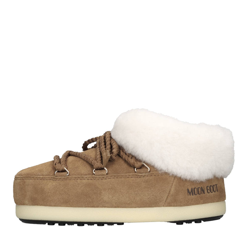 Mules in camoscio e pelliccia 