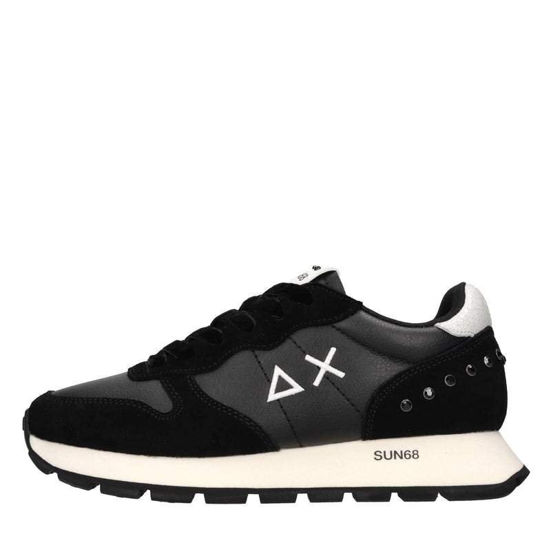 Sneakers in pelle, tessuto ed ecopelle 
