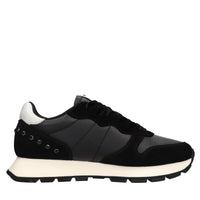 Sneakers in pelle, tessuto ed ecopelle 