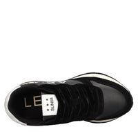 Sneakers in pelle, tessuto ed ecopelle 
