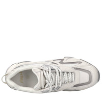 Sneakers in pelle e tessuto 