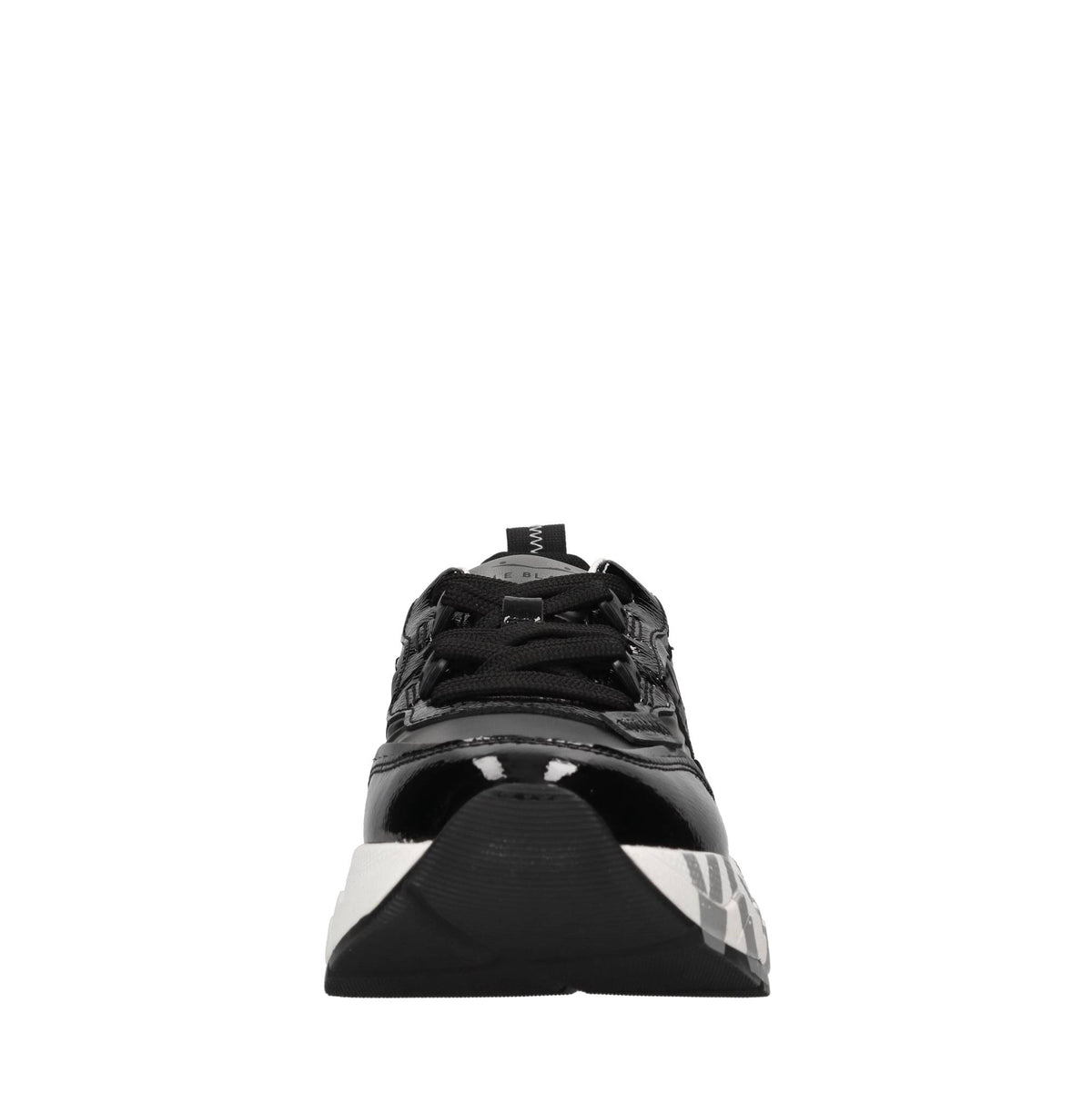 Sneakers in vernice e tessuto tecnico 