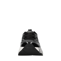 Sneakers in vernice e tessuto tecnico 