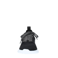 Sneakers in tessuto e pelle 