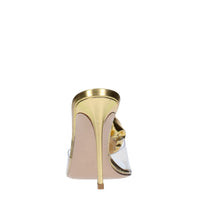 Mules in pelle e PVC 