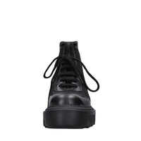 Sneakers in pelle e tessuto 