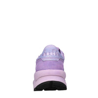 Sneakers in pelle e tessuto 