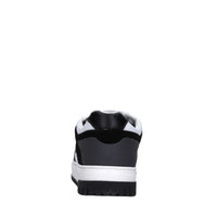 Sneakers in pelle e tessuto 