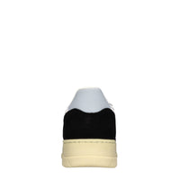 Sneakers in pelle e tessuto 