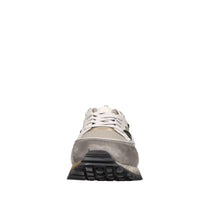 Sneakers in pelle e tessuto 